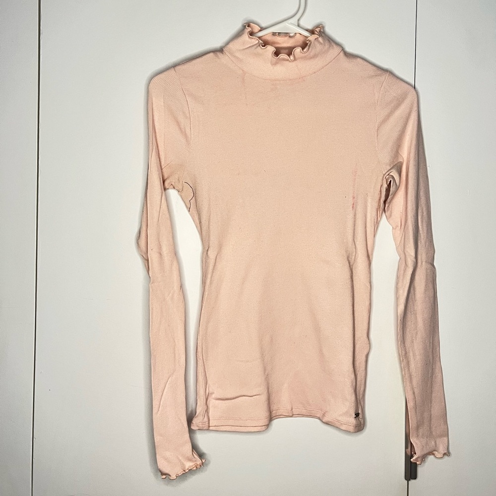 Pink turtleneck ruffle
